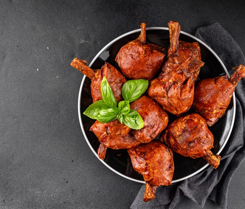 Knuckle smoked meat cooked ham roulka fresh shank delicious gourmet food background on the table rustic food top view copy space